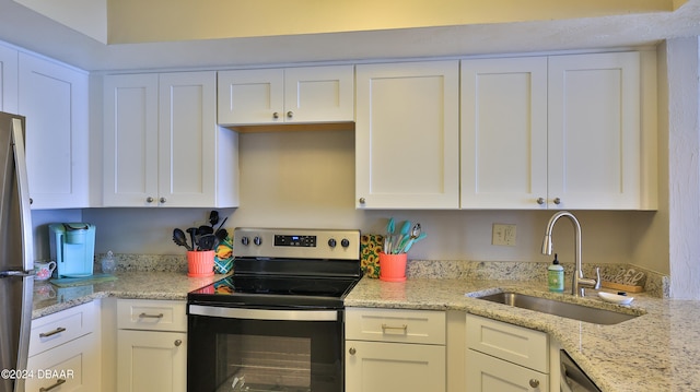 kitchen with white cabinets, sink, and stainless steel appliances