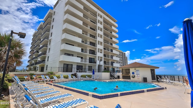 view of pool featuring a patio area