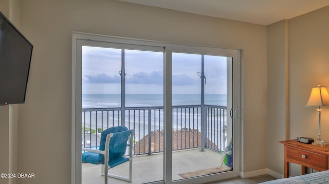 bedroom featuring a water view