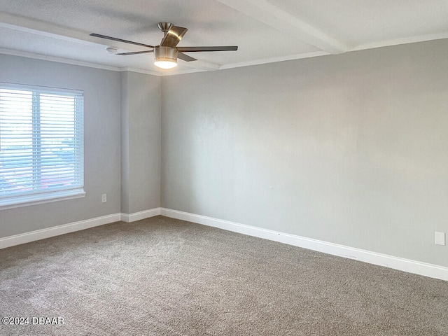 unfurnished room featuring beamed ceiling, ceiling fan, and carpet floors