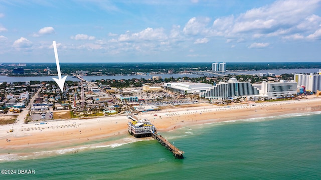 bird's eye view with a beach view and a water view