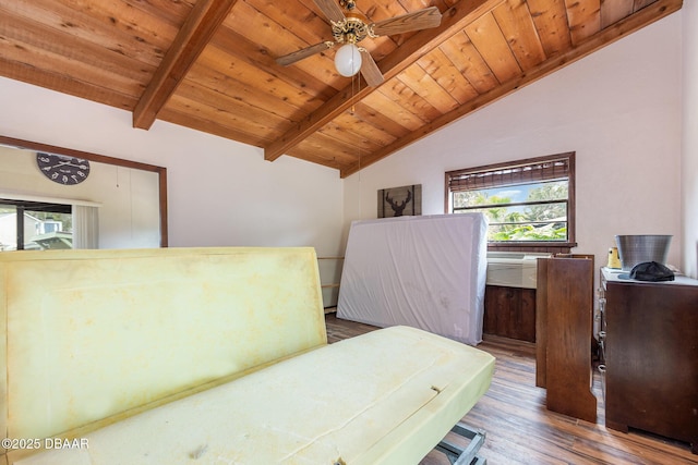 bedroom with hardwood / wood-style floors, wood ceiling, cooling unit, vaulted ceiling with beams, and ceiling fan