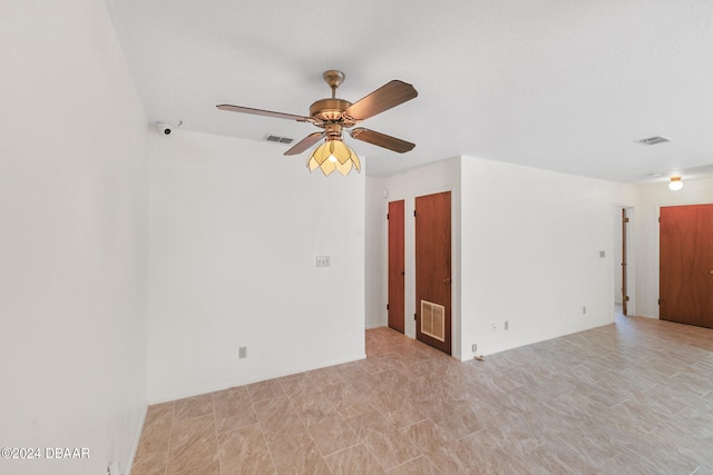 empty room with ceiling fan