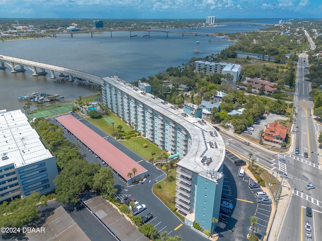 birds eye view of property featuring a water view