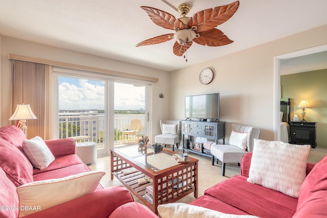 living room with ceiling fan and light tile patterned flooring