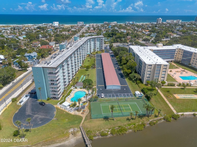 bird's eye view featuring a water view and a city view