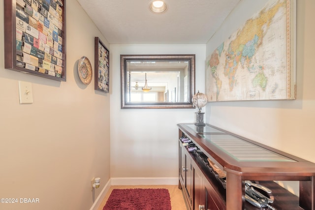 interior space featuring baseboards