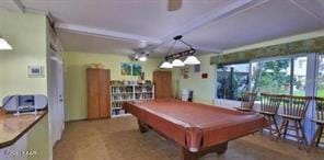 rec room featuring pool table and beamed ceiling