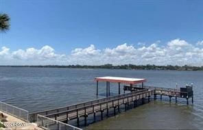 dock area featuring a water view