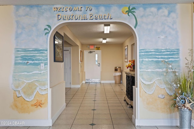 hall featuring tile patterned floors