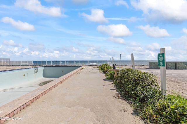 exterior space with a water view