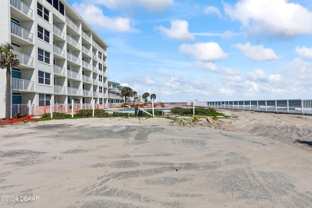 exterior space with a beach view