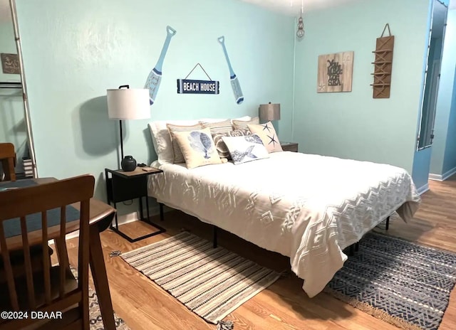 bedroom featuring hardwood / wood-style floors