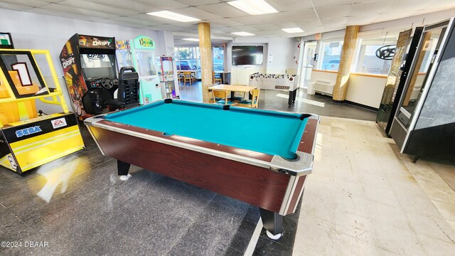 game room featuring pool table and a drop ceiling