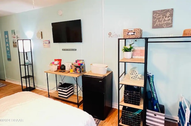 bedroom with light wood-type flooring