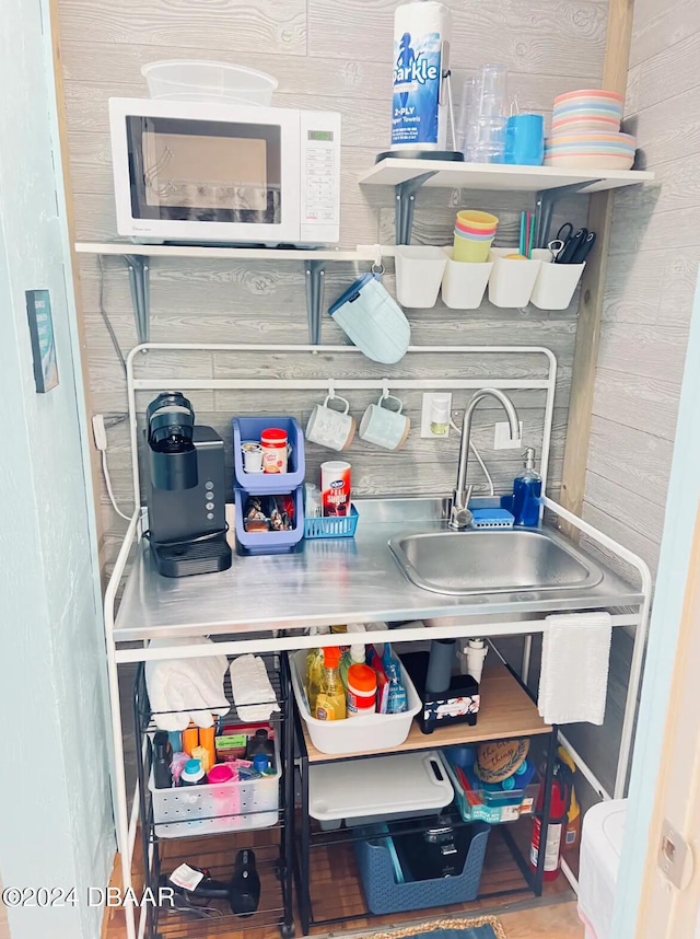 1233 N Atlantic Ave Unit 212, Daytona Beach, FL 32118 - storage area featuring a sink