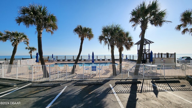 1233 N Atlantic Ave Unit 212, Daytona Beach, FL 32118 - community pool featuring fence and a water view