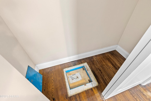 interior details with wood finished floors and baseboards