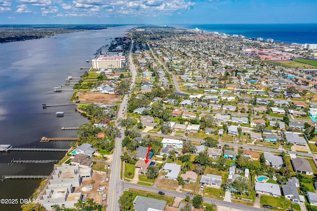 drone / aerial view with a water view