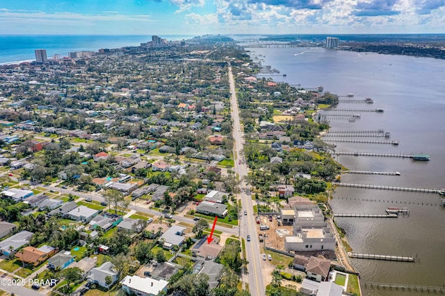 drone / aerial view with a water view