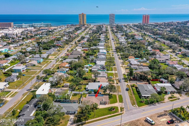 bird's eye view with a view of city and a water view