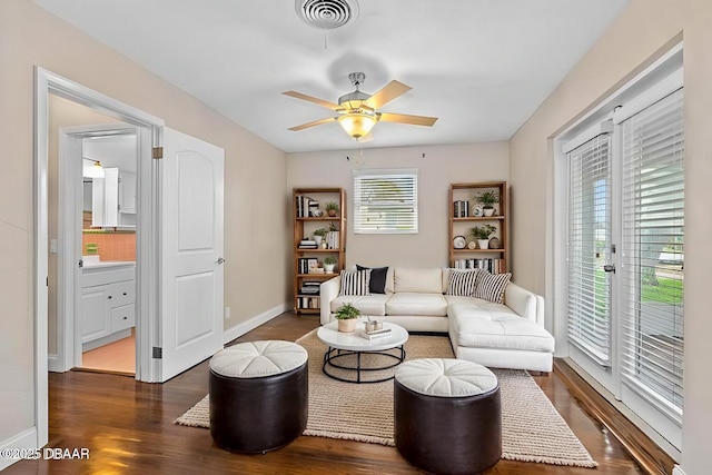 201 Woodland Ave, Daytona Beach, FL 32118 - living area with wood finished floors, a ceiling fan, and baseboards