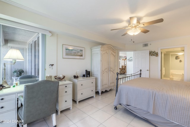 bedroom with ceiling fan, light tile patterned floors, ensuite bathroom, and ornamental molding