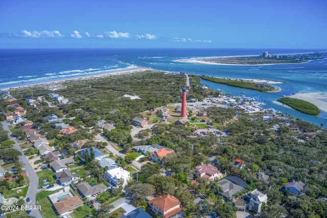 aerial view featuring a water view and a view of the beach