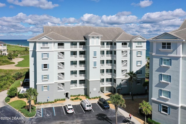 view of building exterior with a water view