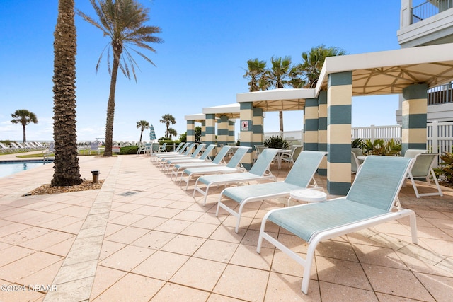 view of patio / terrace featuring a community pool