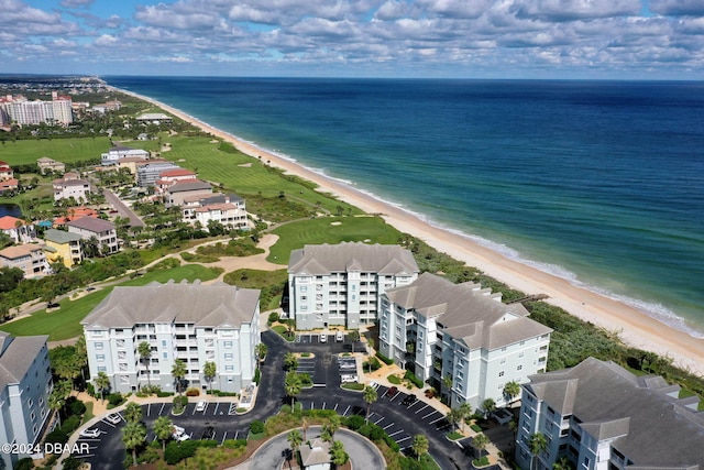 bird's eye view with a view of the beach and a water view