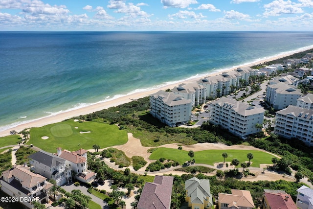 bird's eye view with a beach view and a water view