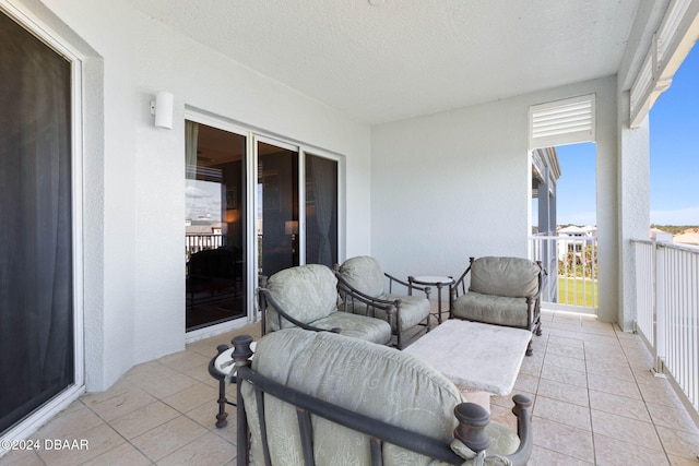 view of patio / terrace featuring a balcony