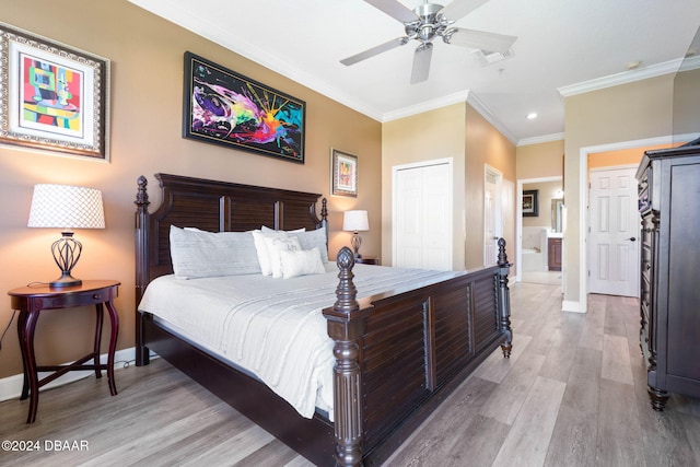 bedroom with light hardwood / wood-style floors, ensuite bath, ornamental molding, ceiling fan, and a closet