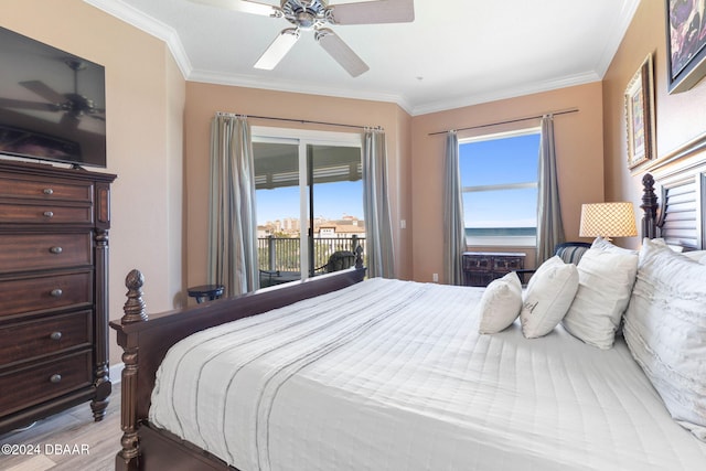 bedroom featuring light hardwood / wood-style flooring, multiple windows, ceiling fan, and access to exterior