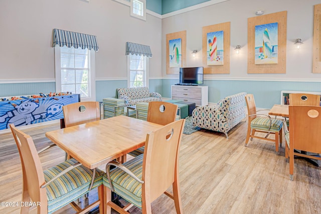 dining room with light wood-type flooring