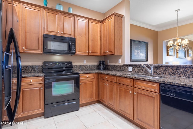 kitchen with an inviting chandelier, sink, black appliances, and ornamental molding