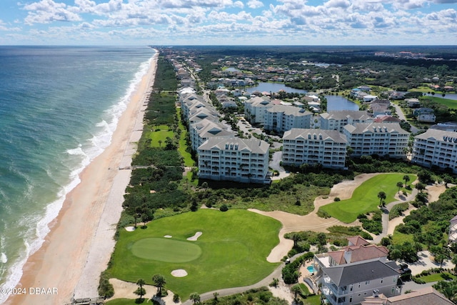 bird's eye view featuring a beach view and a water view