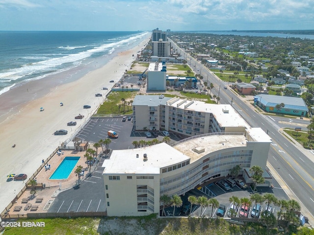 bird's eye view with a view of the beach and a water view