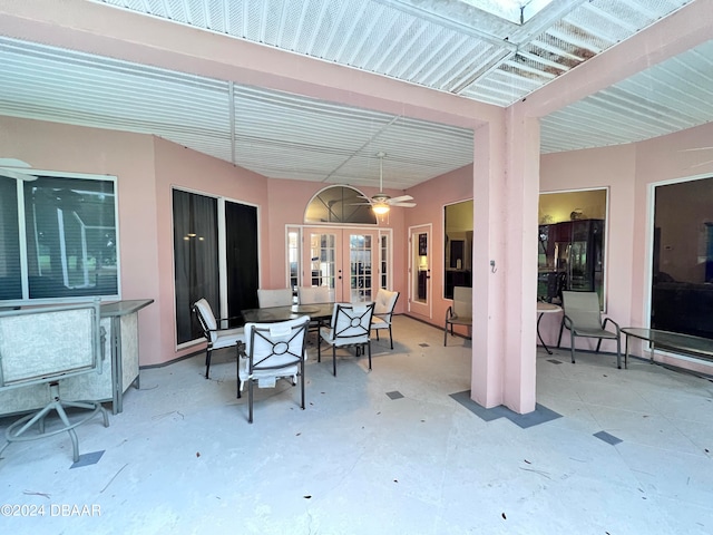 view of patio / terrace featuring ceiling fan and french doors