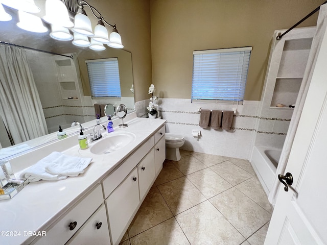 6382 Longlake Dr, Port Orange, FL 32128 - bathroom featuring a shower with curtain, vanity, tile walls, tile patterned floors, and a wainscoted wall