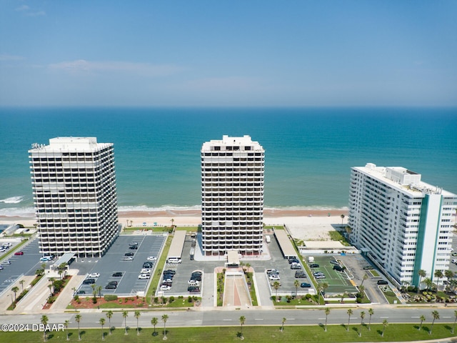 aerial view featuring a water view and a beach view