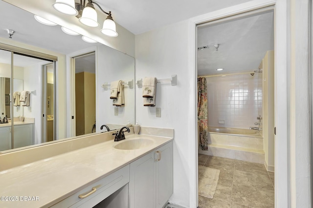 bathroom featuring tile patterned floors, vanity, and shower / bath combination with curtain