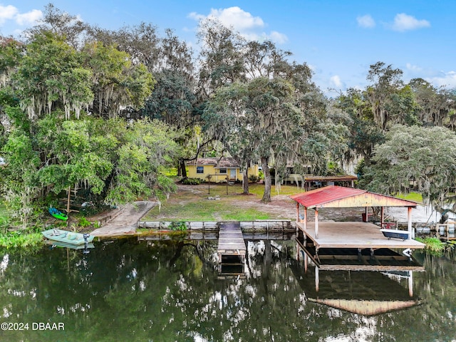 dock area featuring a water view