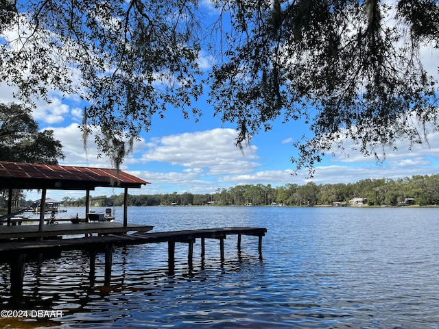 view of dock with a water view