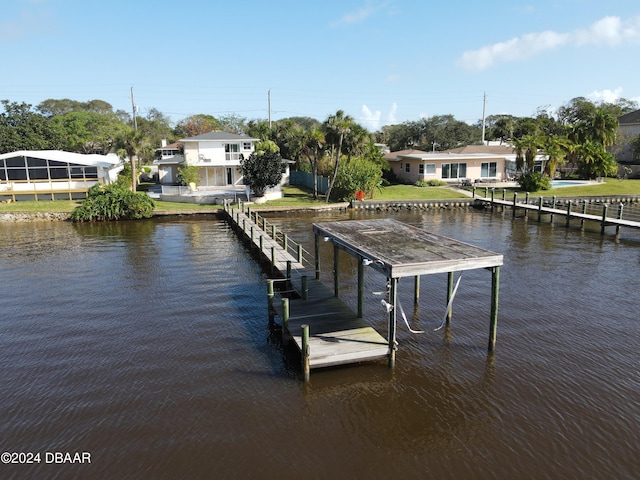 dock area with a water view