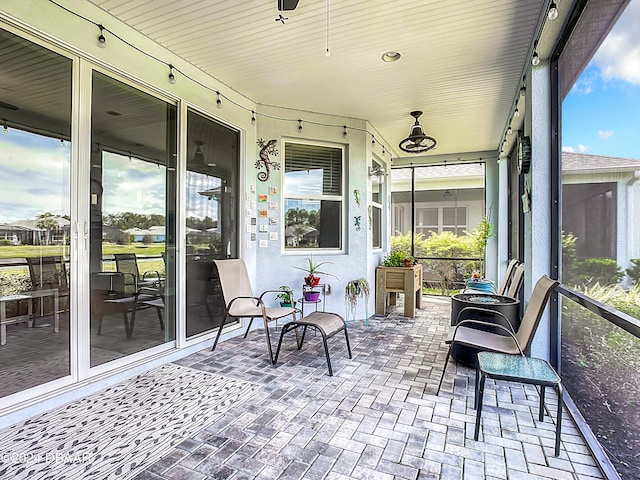 sunroom / solarium with a healthy amount of sunlight