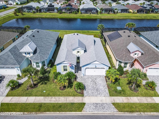 bird's eye view with a water view