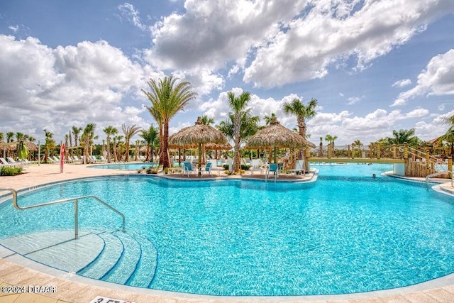 view of pool featuring a patio and a gazebo