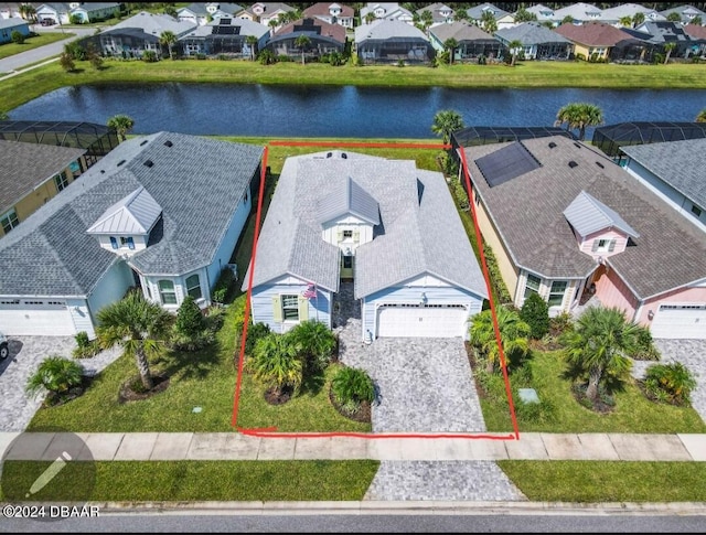 drone / aerial view featuring a water view